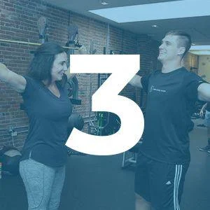 Two people standing with arms extended in a gym setting, facing each other and smiling, with a large number 3 overlaid on the image.